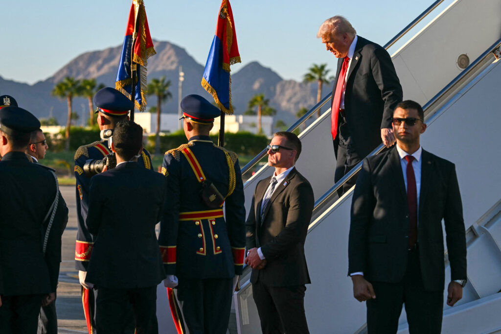 US President Donald Trump disembarks from the Air Force One upon his arrival at Sharm el-Sheikh International Airport in Sharm el-Sheikh on October 13, 2025, to attend a summit on Gaza.