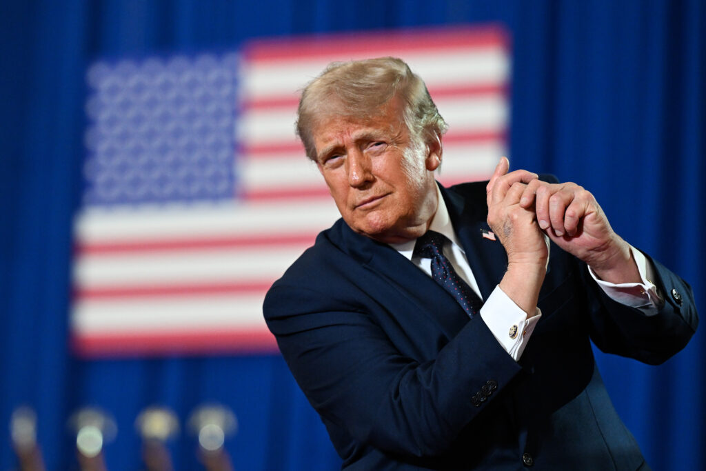 President Donald Trump dances on stage after delivering remarks during a campaign and economic policy event in the Eugene Levy Fieldhouse at SUNY Rockland Community College on May 22, 2026 in Suffern, New York.