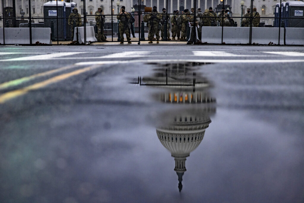 National Guard troops continue to guard the grounds of the US Capitol building in the extended security perimeter around Capitol Hill following the January 6th attack by a pro-Trump mob on February 11, 2021 in Washington, DC.